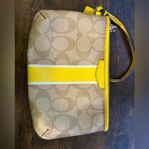 Yellow and bray coach wristlet